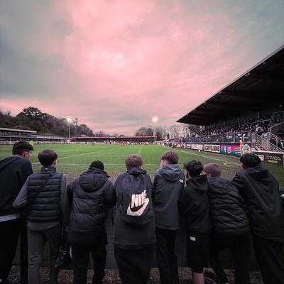 Spectators at a football ground